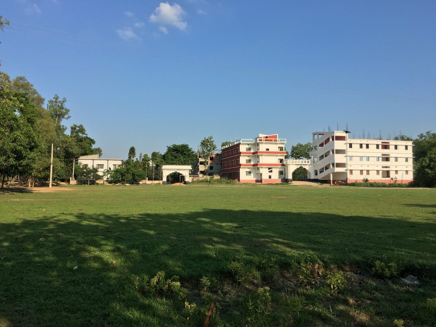 College buildings across the green playground