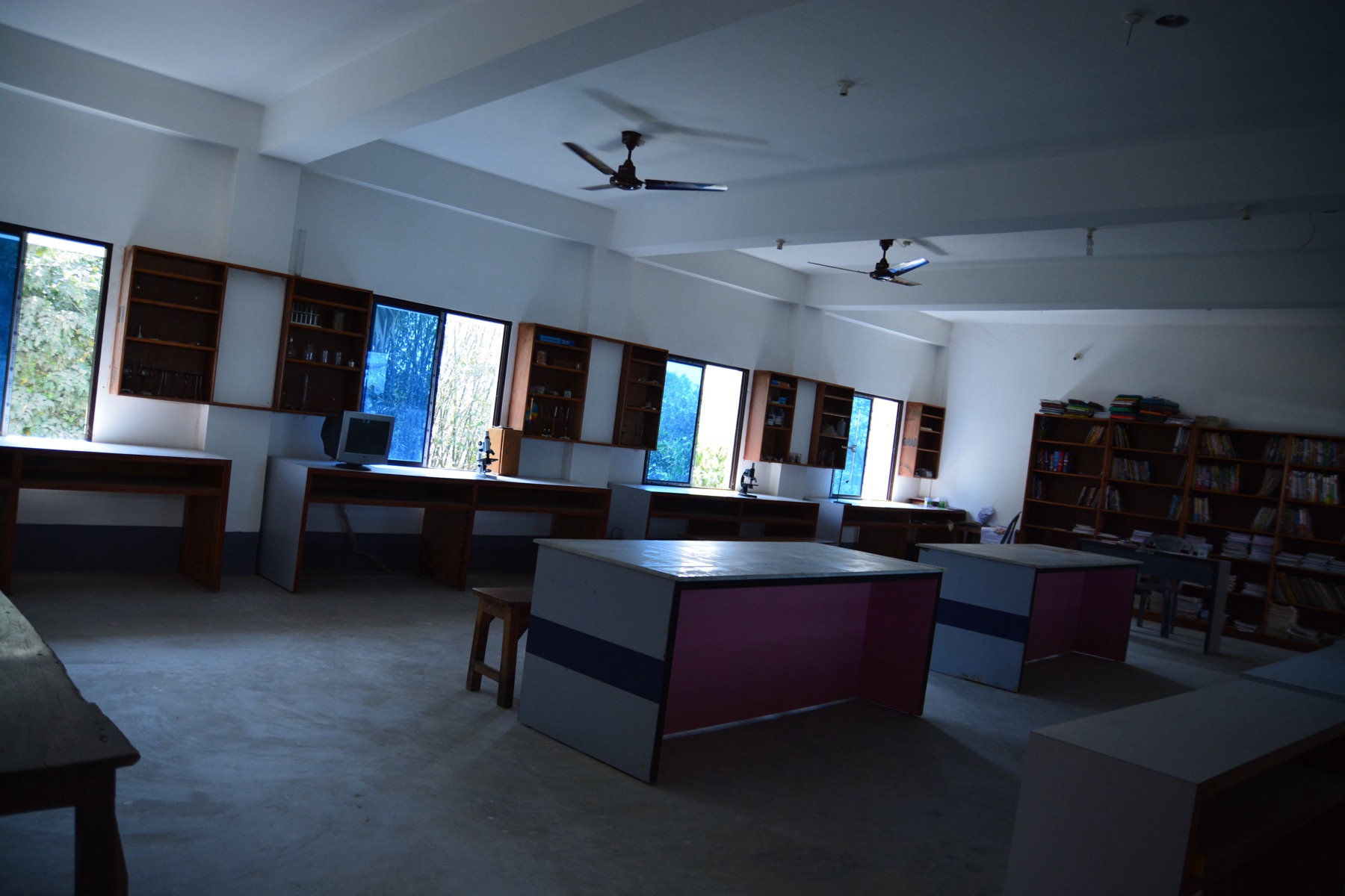 Physics laboratory with meter bridge and battery eliminators